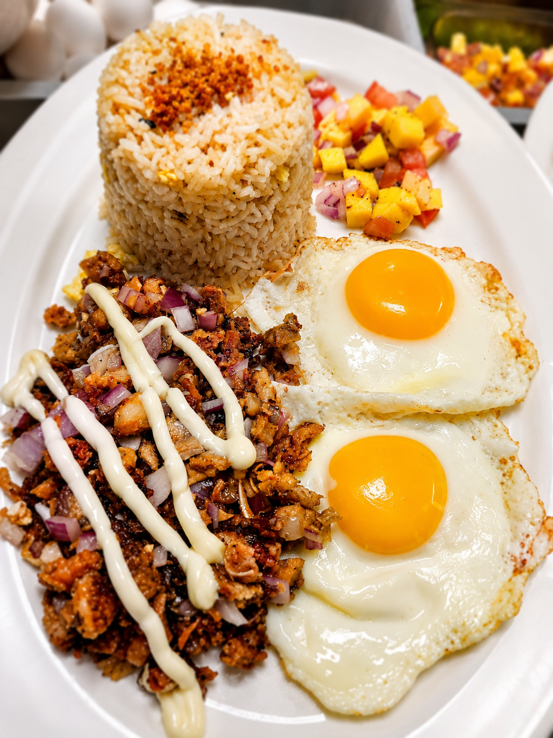 Silog plate with garlic rice, fried eggs and savoury chopped meat